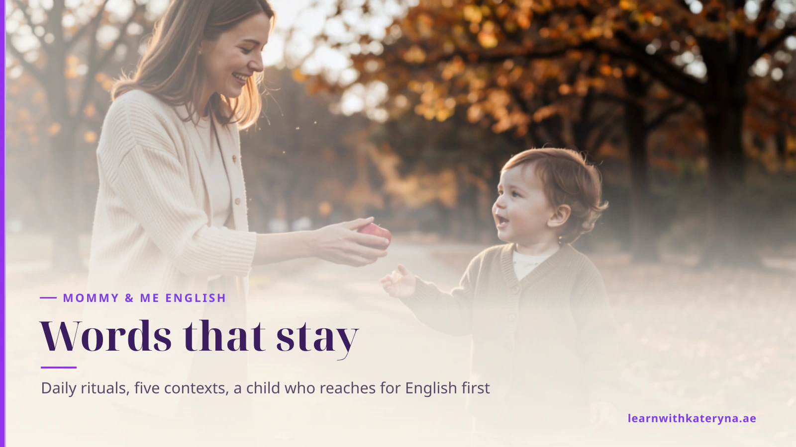 Toddler talking animatedly to their laughing mother on a golden-hour park path while holding an apple