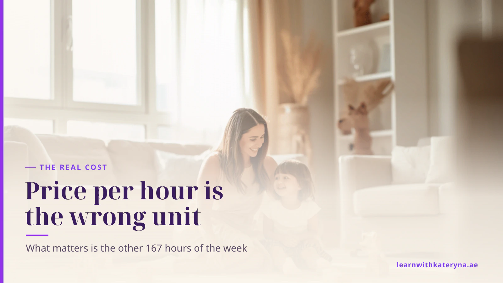 A mother and her small daughter sitting together on a rug in a sunlit Dubai living room