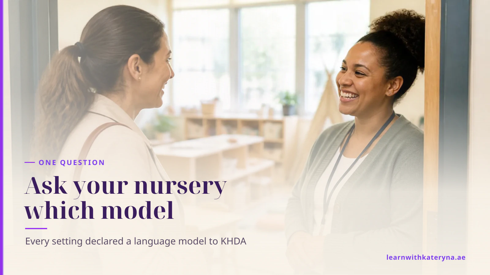 A parent talking with a nursery teacher in the doorway of a bright early years classroom