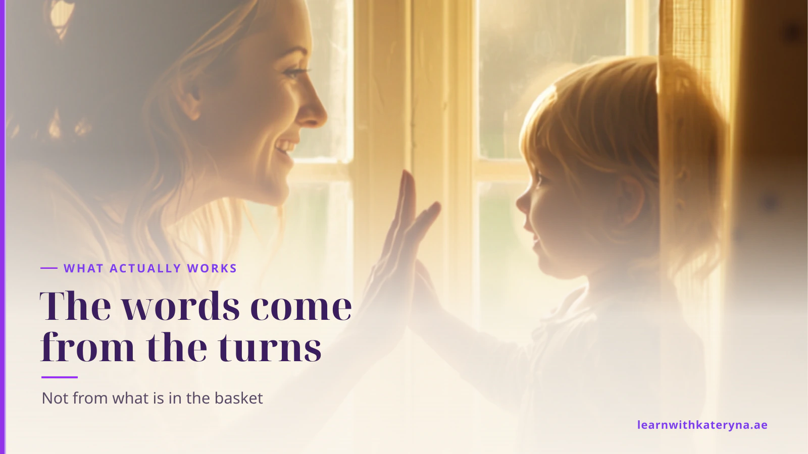 A mother crouches at eye level by a sunlit window as her child speaks to her and their hands meet