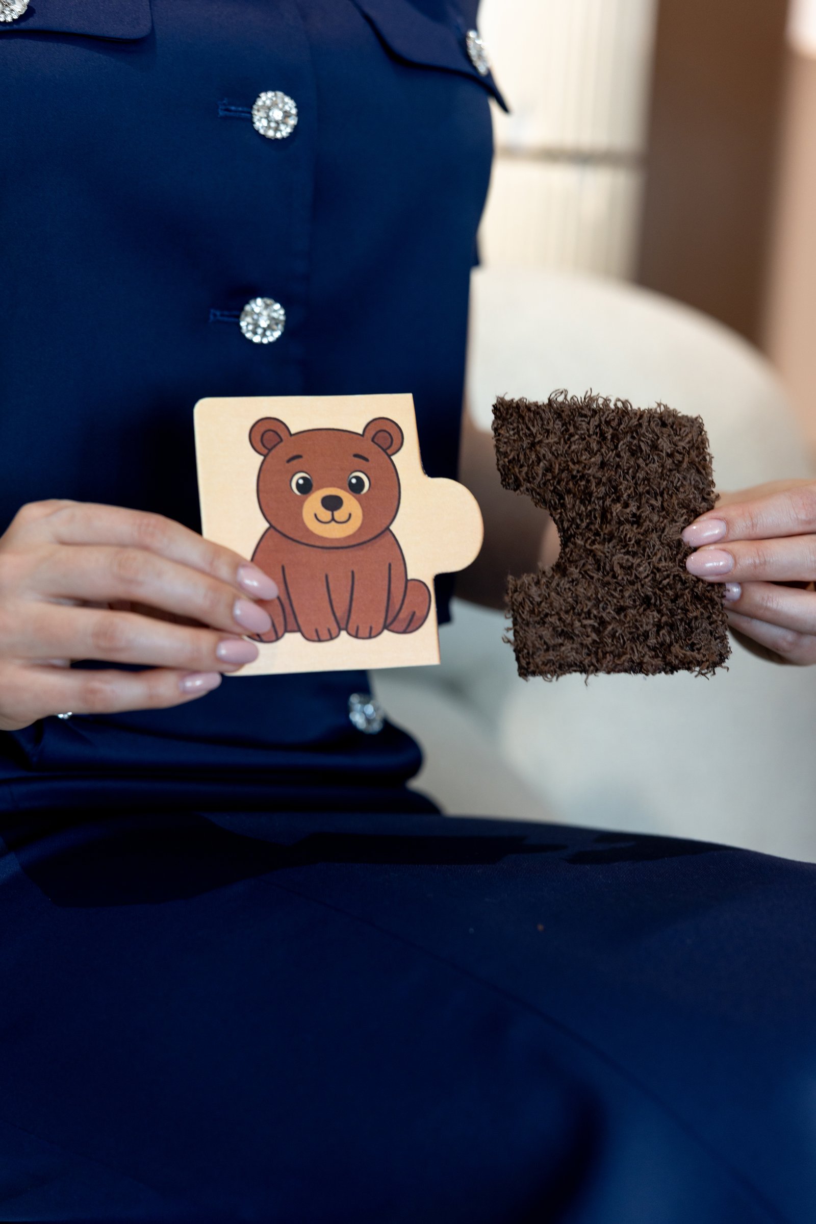 Young child learning English through play and flashcards in Dubai